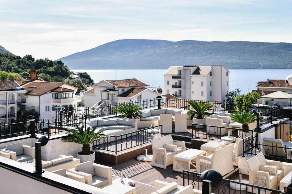 Rooftop terrace with sea and mountain views